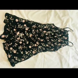 black halter top romper, floral detailing